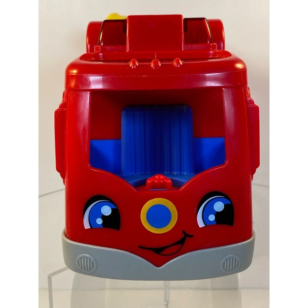 Fisher Price Little People Musical Red Fire Truck Lights Water Hose and Figures